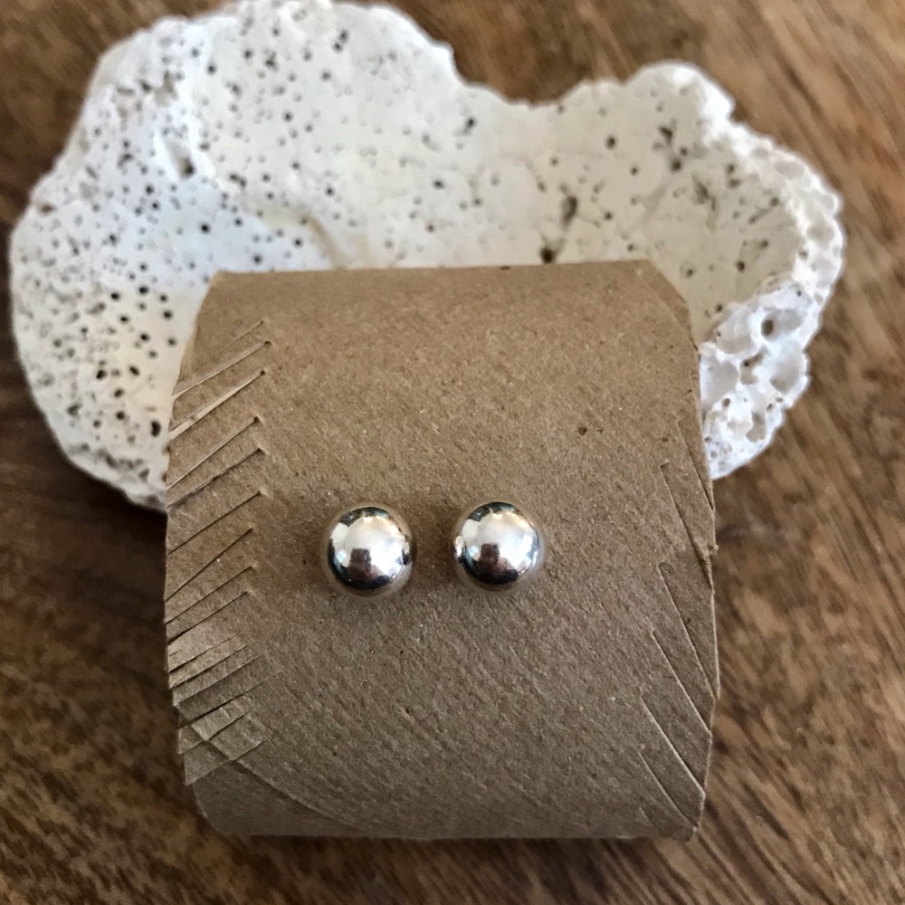 Sterling silver ball stud earrings.